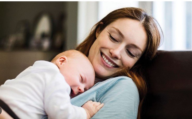 mother and her baby sleeping 