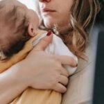 mother holding her baby