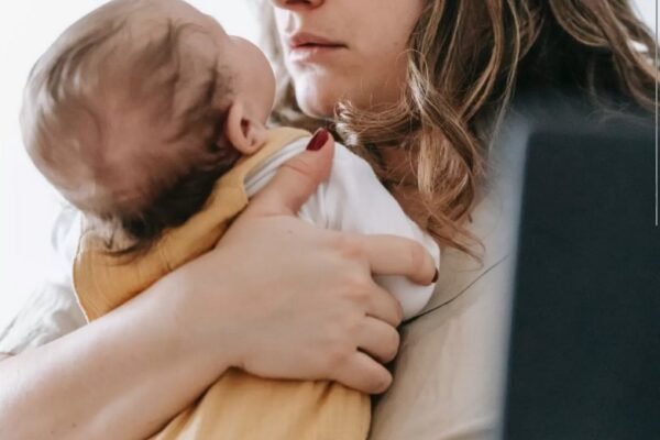 mother holding her baby